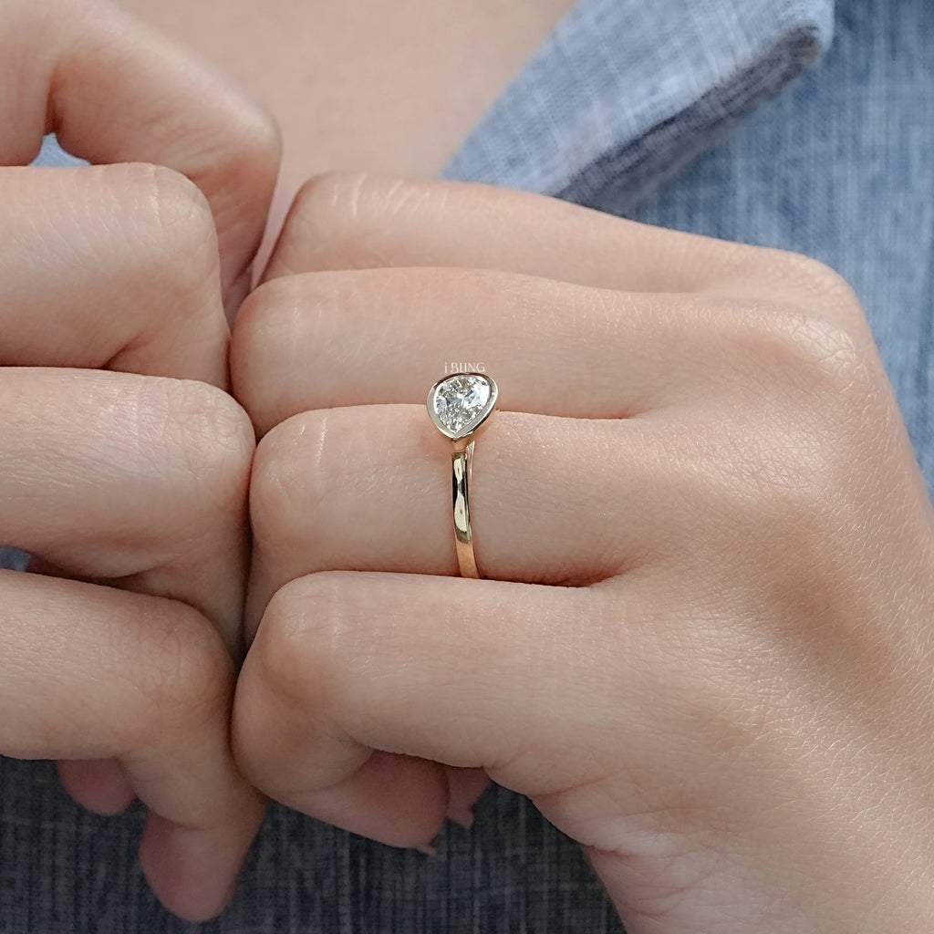 East West Pear Diamond Bezel Set Engagement Ring
