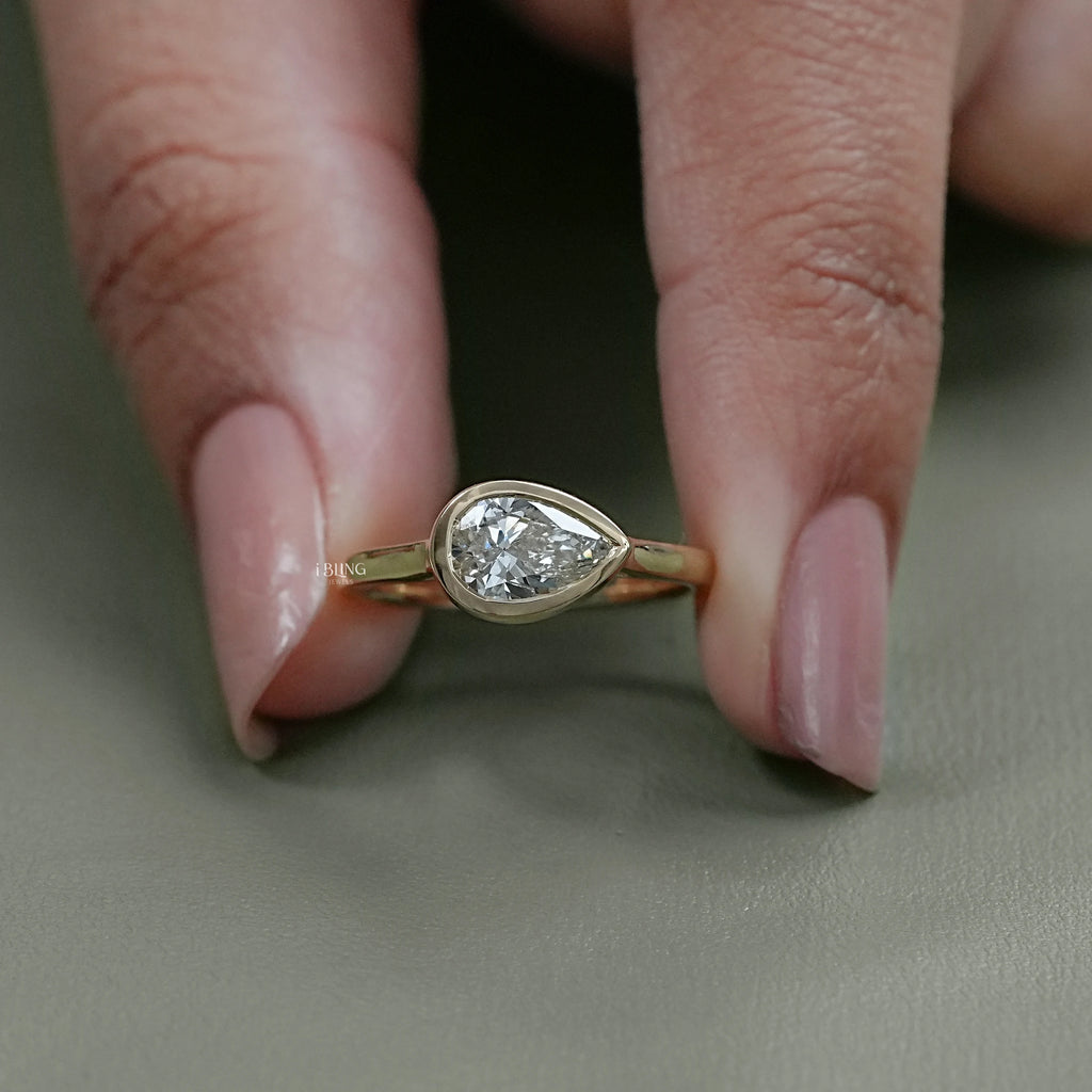 East West Pear Diamond Bezel Set Engagement Ring