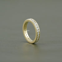 Round Diamond Channel Set Eternity Wedding Band