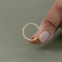 Round Diamond Channel Set Eternity Wedding Band