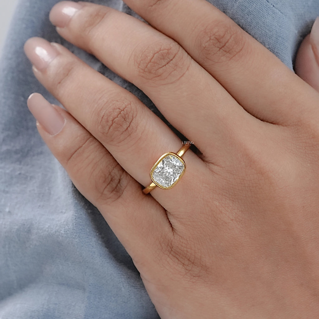 East West Cushion Cut Bezel Solitaire Engagement Ring