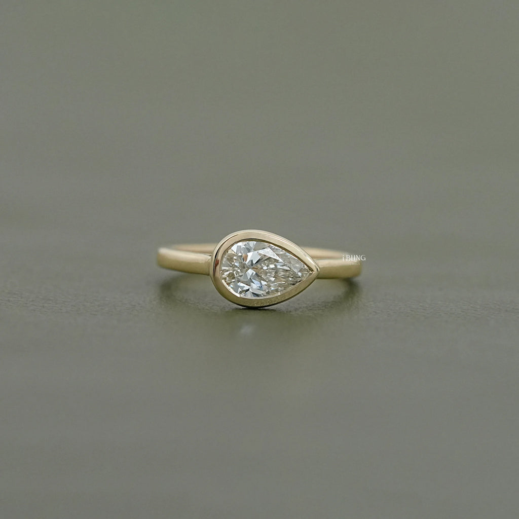 East West Pear Diamond Bezel Set Engagement Ring