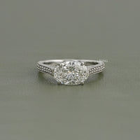 East-West Oval Cut Hidden Halo Pave Ring