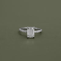 Emerald Cut Solitaire Accent Engagement Ring