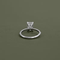 Emerald Cut Solitaire Accent Engagement Ring