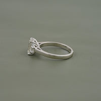 Emerald Cut Three Stone Engagement Ring