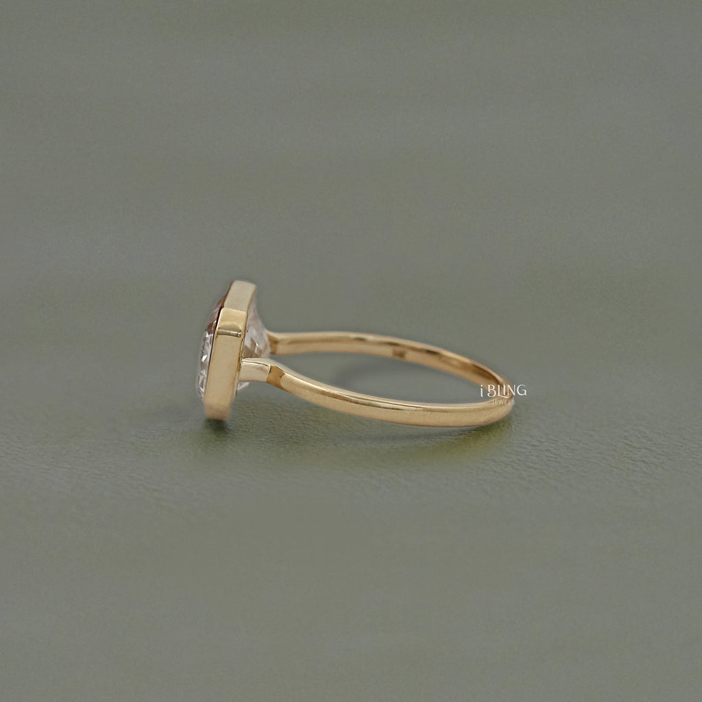 Bezel East West Set Emerald Diamond Ring