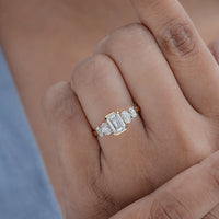 Half Bezel Set Emerald And Oval Five Stone Engagement Ring
