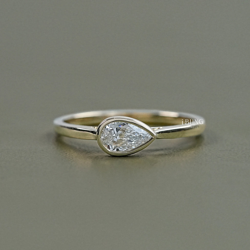 East West Pear Diamond Bezel Set Engagement Ring