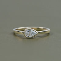 East West Pear Diamond Bezel Set Engagement Ring