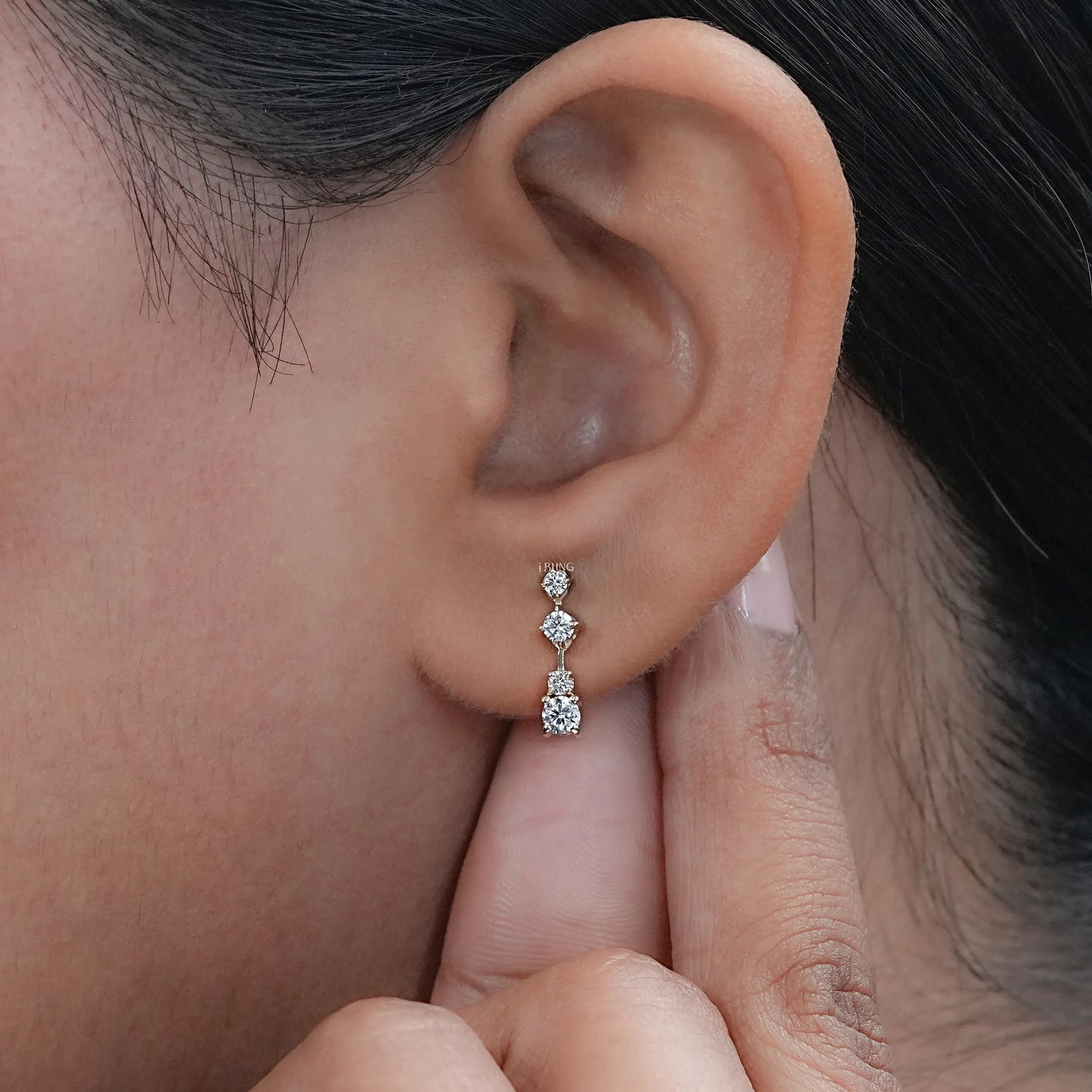 Lab diamond dangle drop earrings on women earlobe, now online in USA