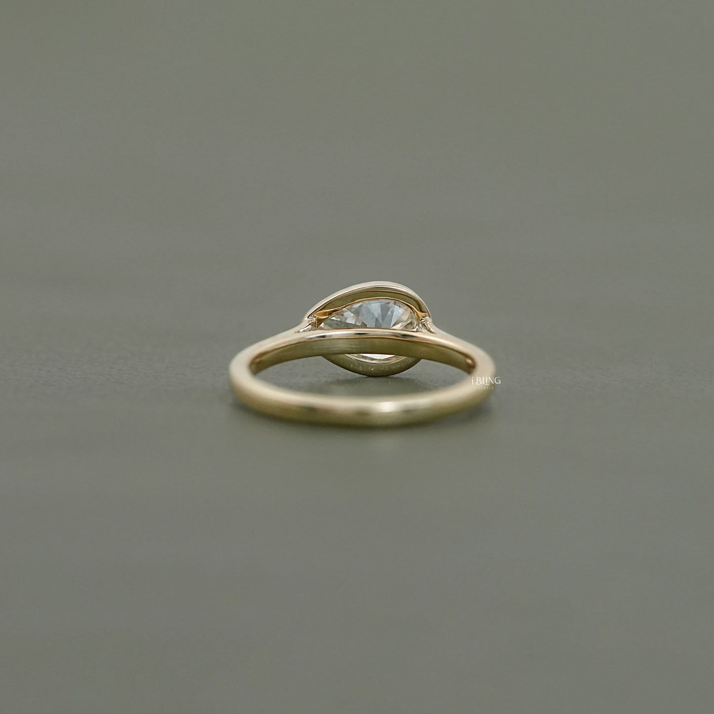 East West Pear Diamond Bezel Set Engagement Ring