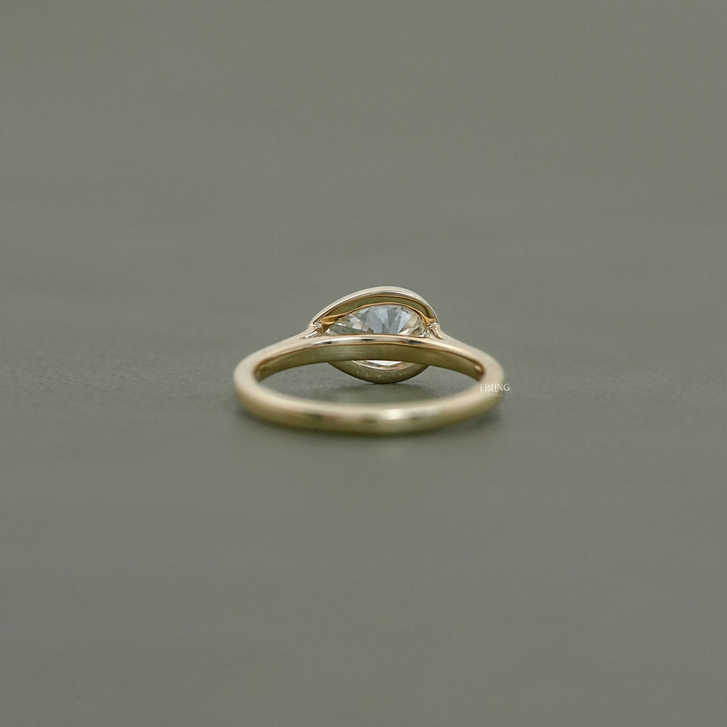 East West Pear Diamond Bezel Set Engagement Ring