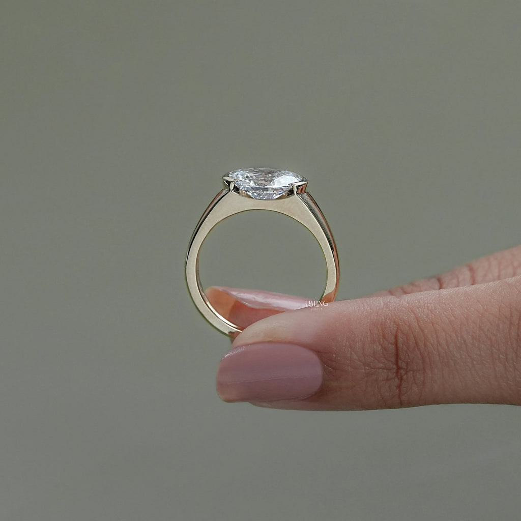 East-West Set Oval Cut Diamond Engagement Ring