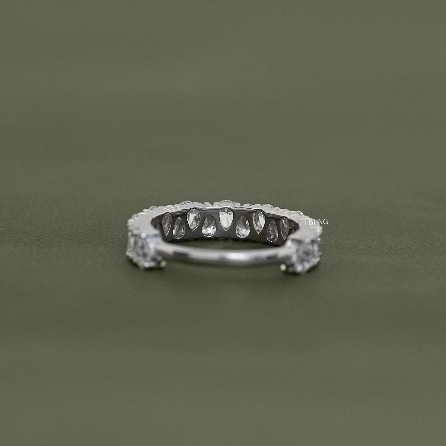 Back view of Pear Cut Diamond Half Eternity Band designed upside down, stylish modern wedding band