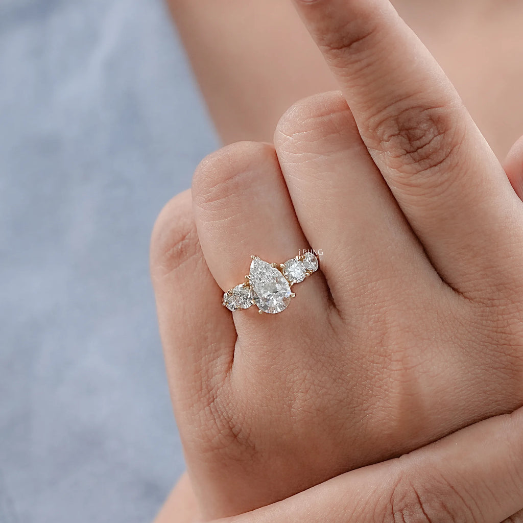 Pear And Round Cut Diamond Five Stone Engagement Ring