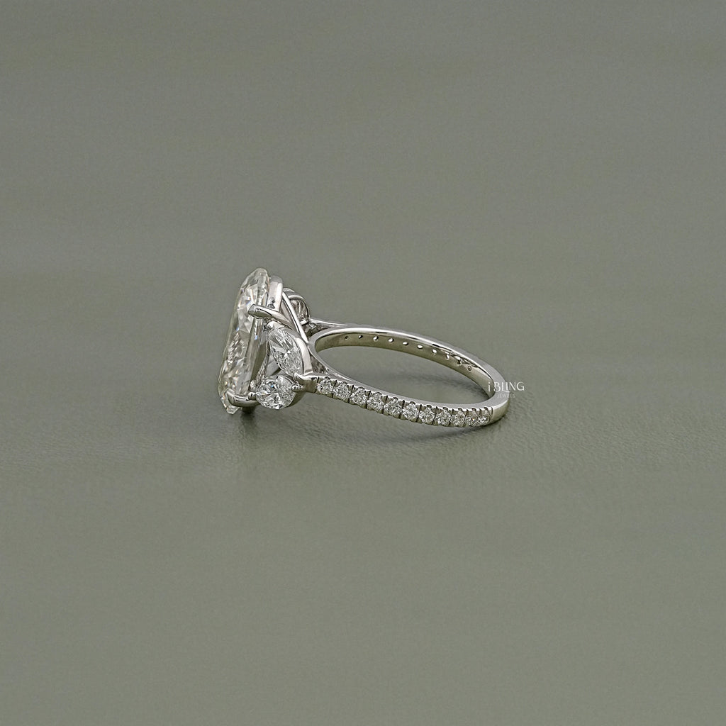 Oval Cut Diamond Solitaire Cluster Engagement Ring