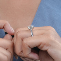 Emerald Cut Three Stone Engagement Ring