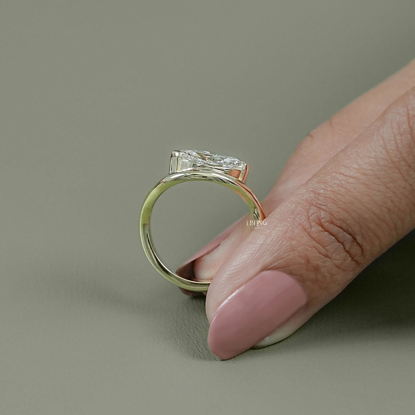 Top view east west diamond ring with marquise cut lab diamond setting