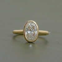 Oval Diamond Hidden Halo Engagement Ring