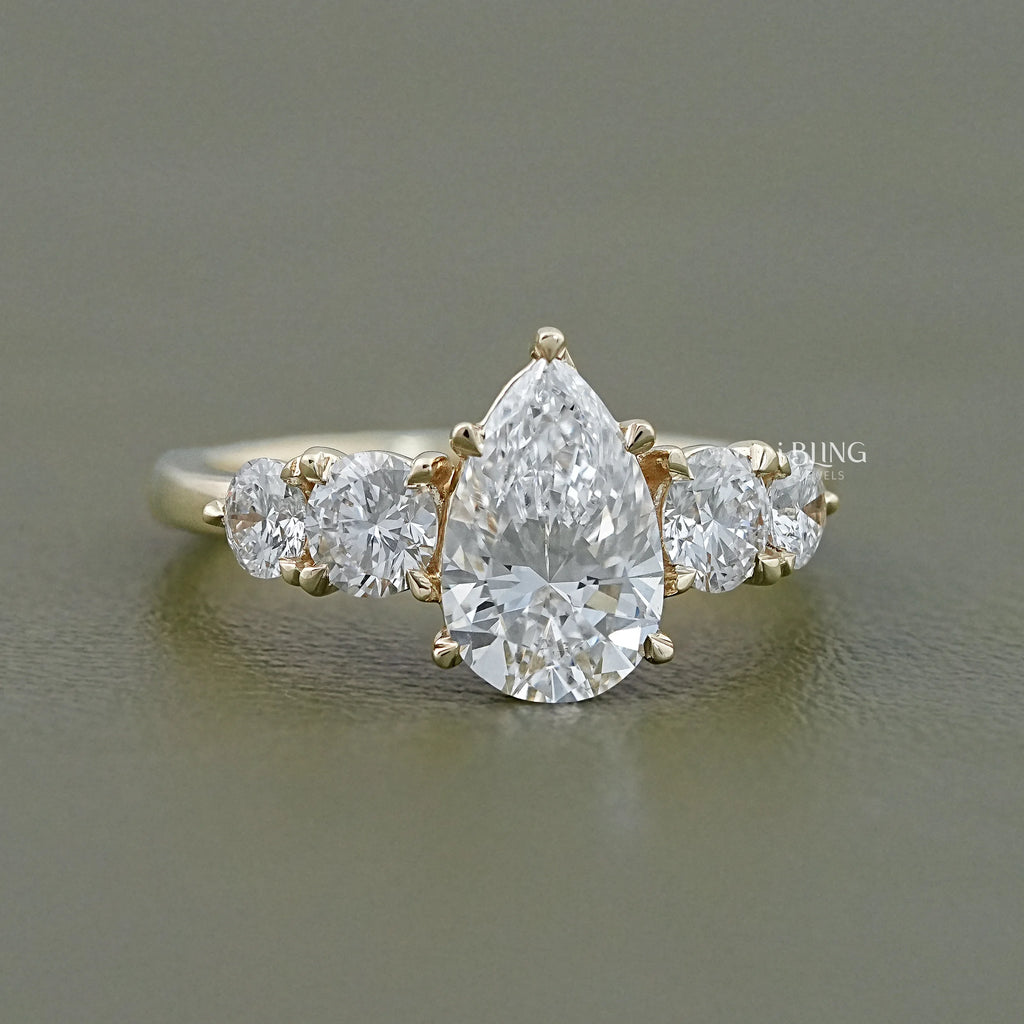 Pear And Round Cut Diamond Five Stone Engagement Ring