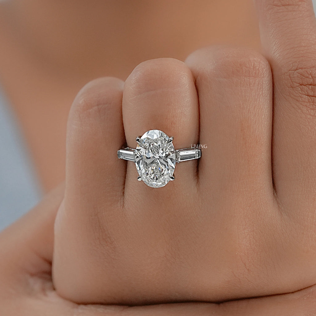 Oval And Tappered Baguette Cut Three Stone Ring