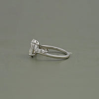 Oval Cut Diamond Solitaire Accent Engagement Ring