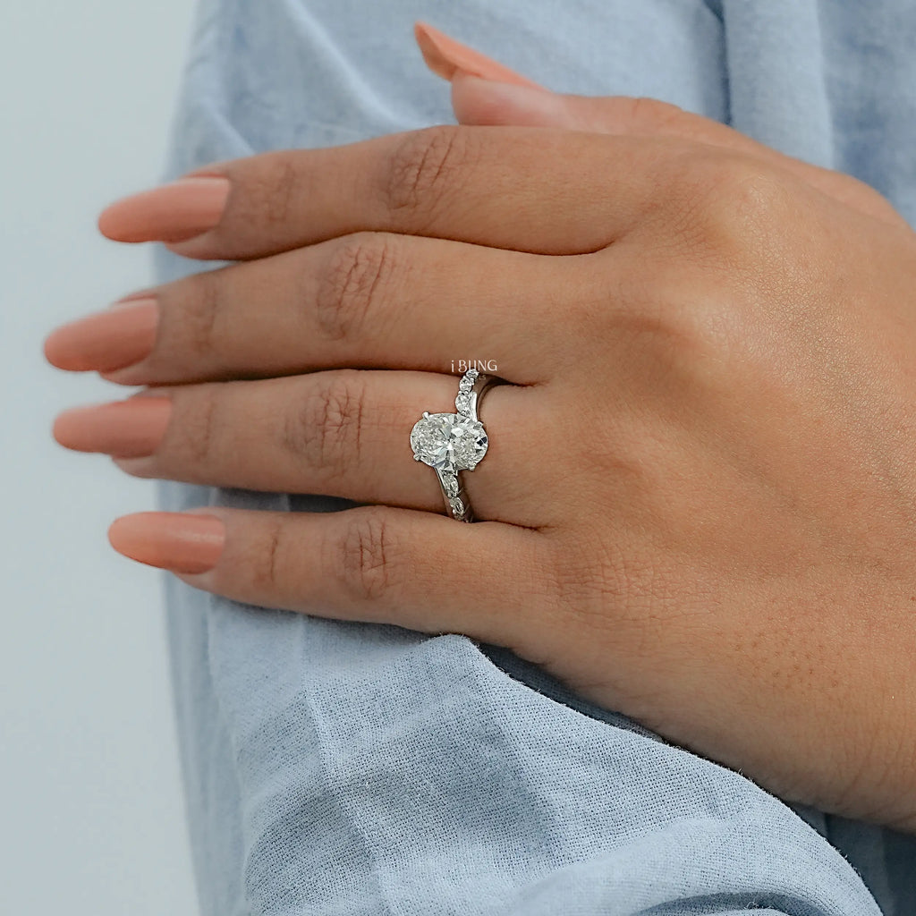 Oval Cut Diamond Solitaire Accent Engagement Ring