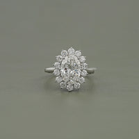 Oval Diamond Halo Solitaire Engagement Ring