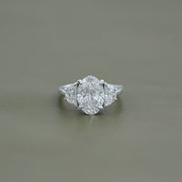 Oval Cut Diamond Three stone Engagement Ring