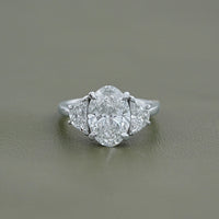 Oval Cut Diamond Three stone Engagement Ring