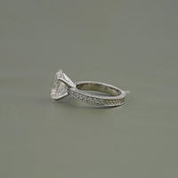 Oval Lab Diamond Solitaire Accent Filigree Ring