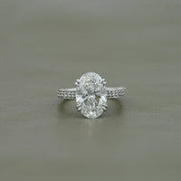 Oval Cut Hidden Halo Pavé Eternity Ring