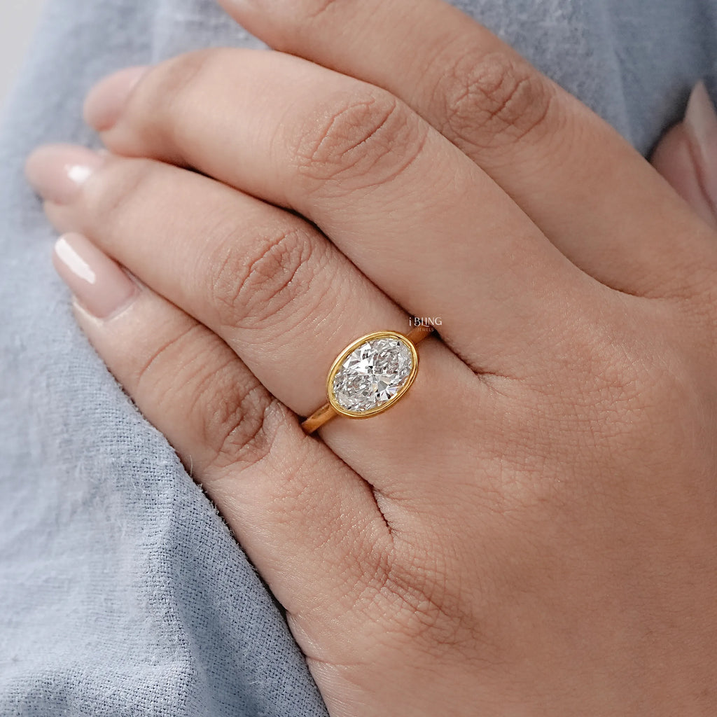 East West Oval Lab Diamond Bezel Set Engagement Ring