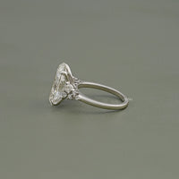 Oval Diamond Solitaire Accent Engagement Ring