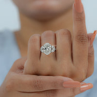 Oval Cut Diamond Solitaire Cluster Engagement Ring