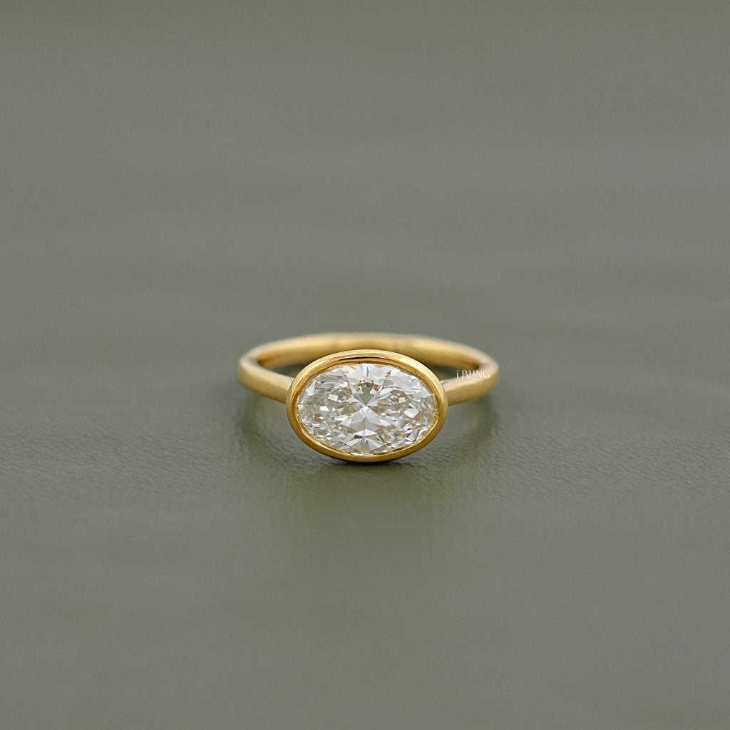 East West Oval Lab Diamond Bezel Set Engagement Ring