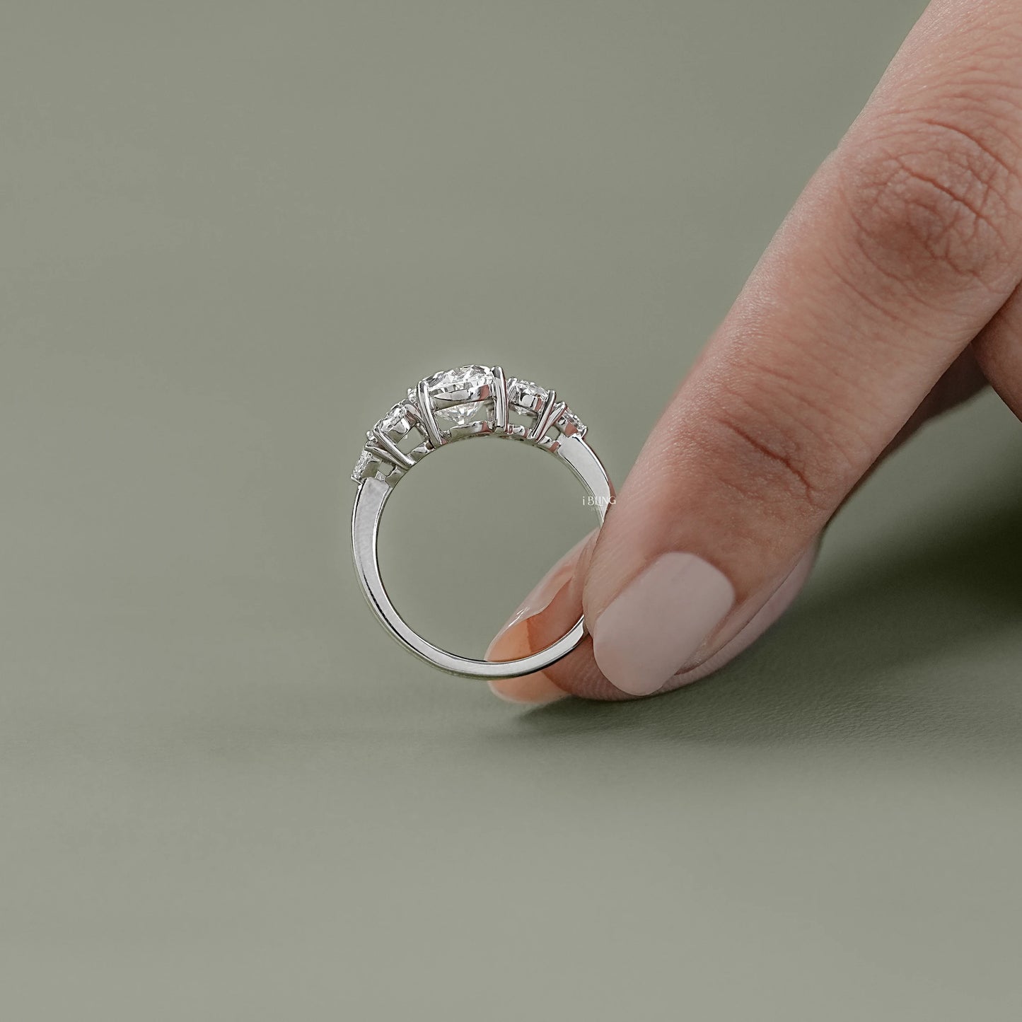 Top view of Oval Lab Grown Diamond Engagement Ring with Five Stone and Trillion details for bridal gift