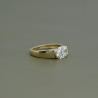East-West Set Oval Cut Diamond Engagement Ring