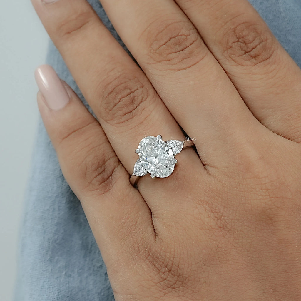 Three Stone Oval Diamond Engagement Ring