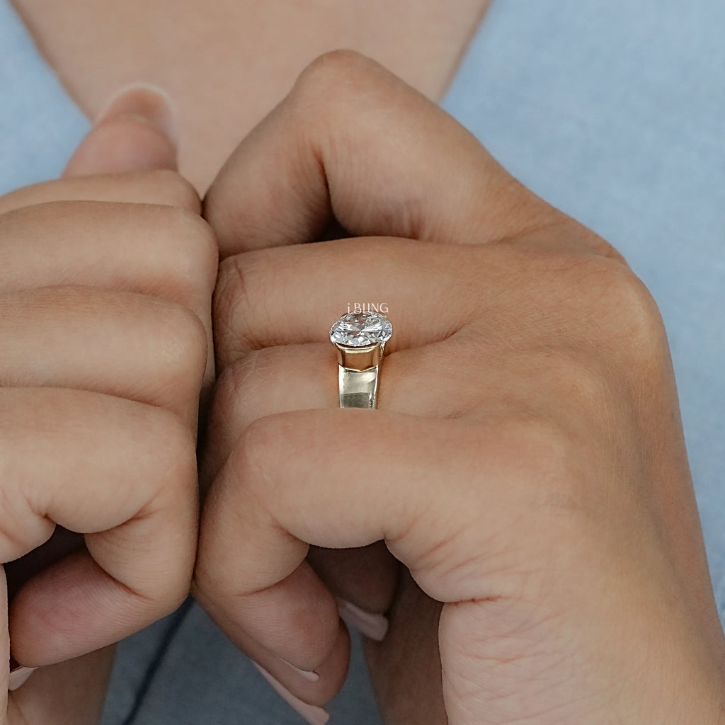 Oval Cut Diamond Half Bezel Set Solitaire Ring