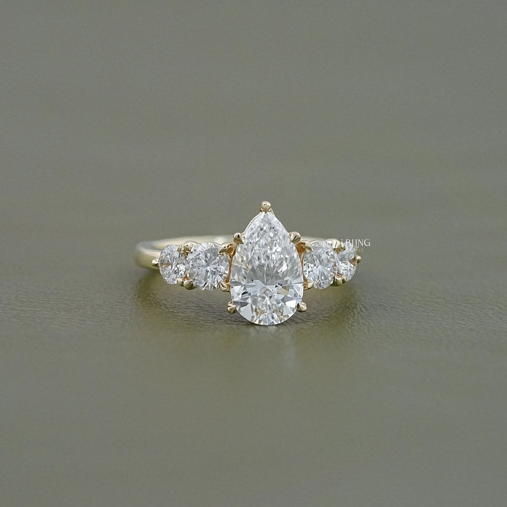 Pear And Round Cut Diamond Five Stone Engagement Ring