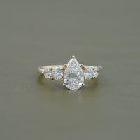 Pear And Round Cut Diamond Five Stone Engagement Ring