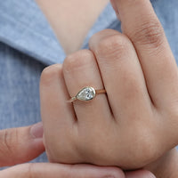 East West Pear Diamond Bezel Set Engagement Ring