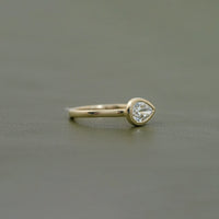 East West Pear Diamond Bezel Set Engagement Ring