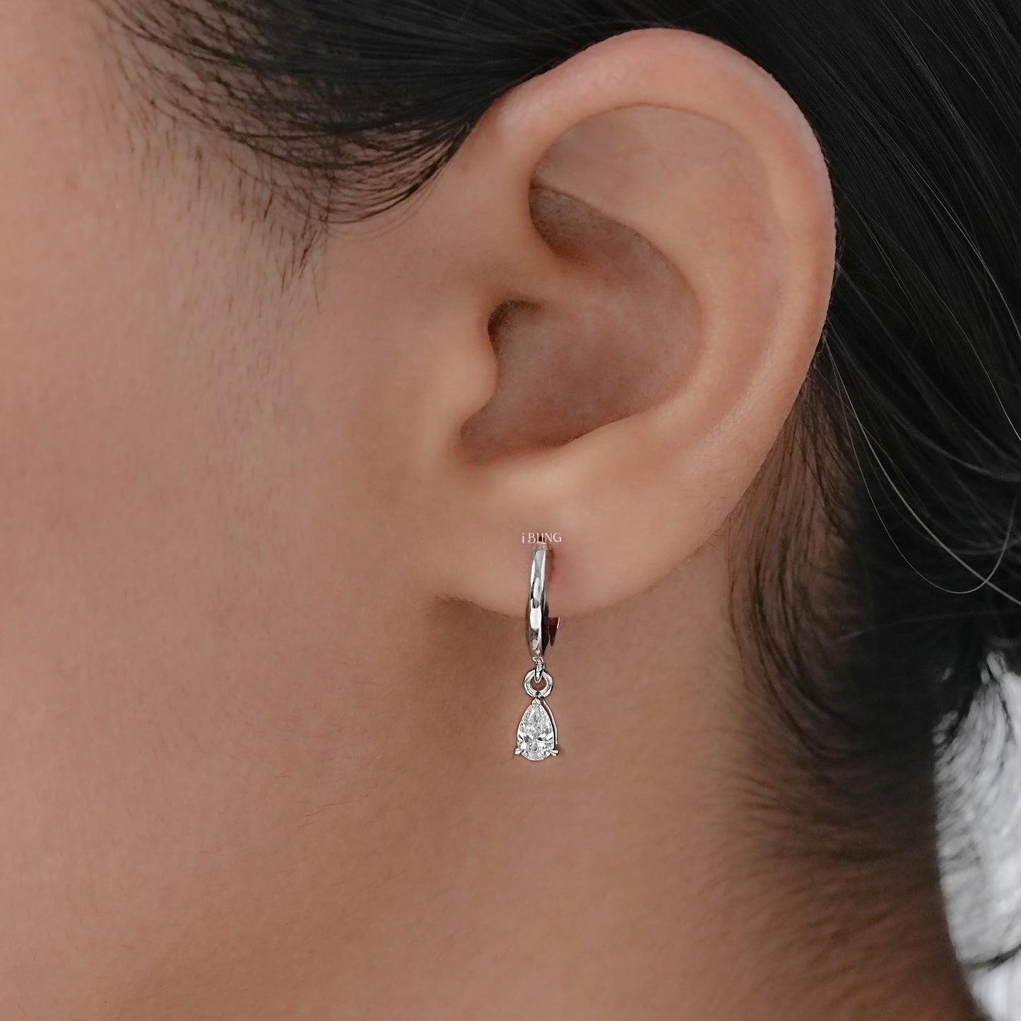 14k white gold earrings on earlobe, affordable jewelry that won t tarnish