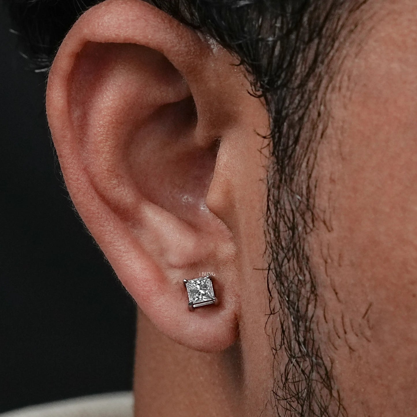 Display View men's diamond earrings highlighting square princess cut brilliance