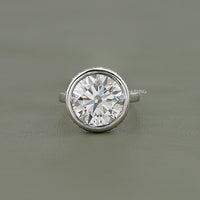 Round Cut Bezel Set Hidden Halo Engagement Ring