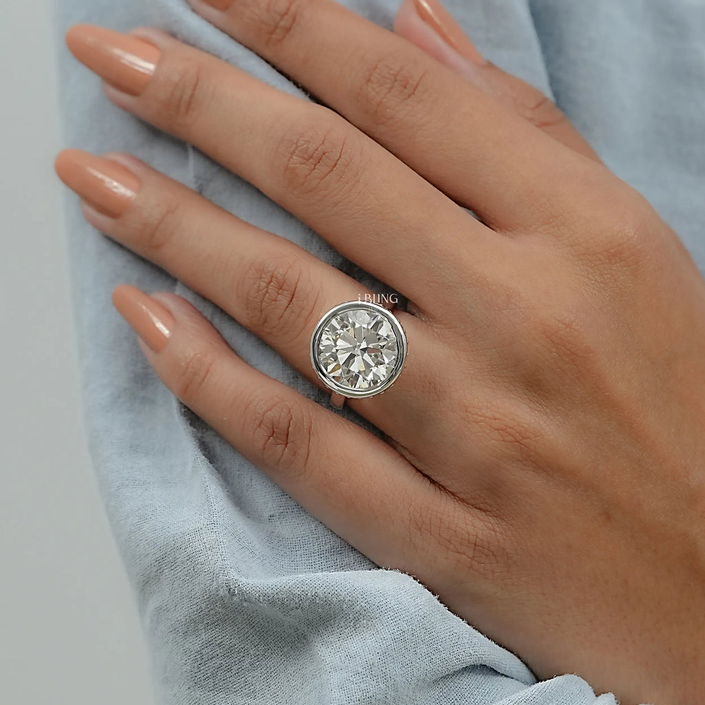 Round Cut Bezel Set Hidden Halo Engagement Ring