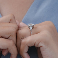 Round Cut Diamond Three Stone Ring With Pear Side Stones